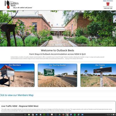 Website design for Outback Beds featuring an orange header with cockatoo logo and outback campfire sunset