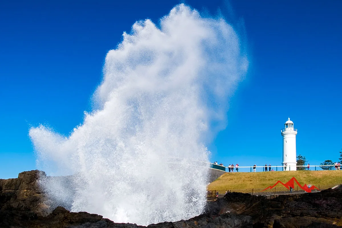 Kiama Blowhole erupting beside Kiama Lighthouse during a 5–6 m swell, NSW South Coast